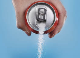 Diet soda can pouring out sugar 